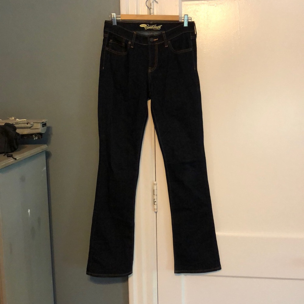Lightly worn dark bell bottom jeans